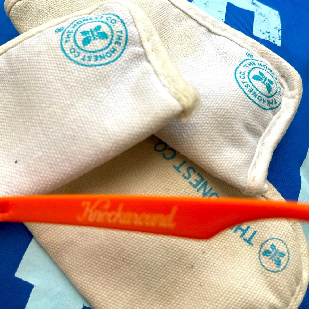 The Honest Company kids orange sunglasses with eyeglass case (two cases).